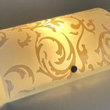 Polished and screen-printed glass sconce by eglo