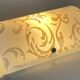 Polished and screen-printed glass sconce by eglo