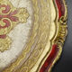 Florentine wooden tray painted with the hand of circular shape