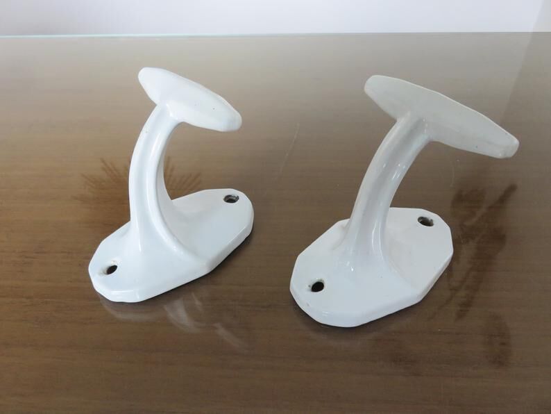 Pair of white cast iron patères art deco 30 40