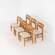 Set of 6 brutalist chairs in oak by Henning Kjaernulf