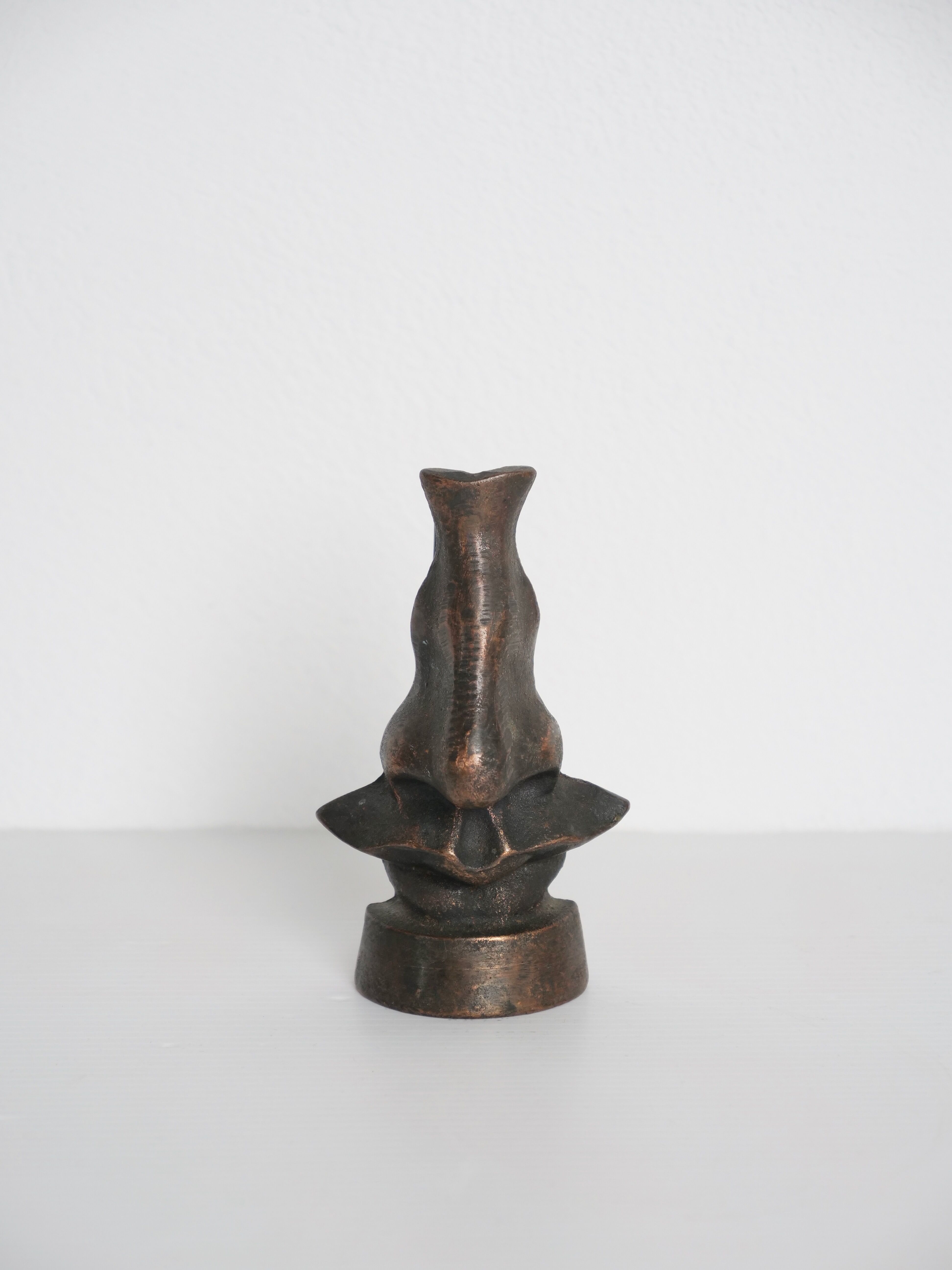 bronze nose sculpture Salvator Dali style