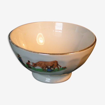 Earthenware bowl decorated with cow decoration