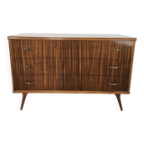 1950s chest of drawers covered in walnut with brass handles
