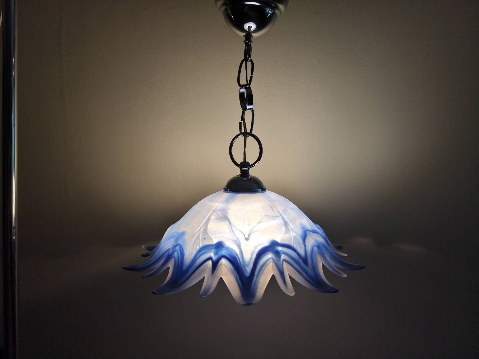 Vintage blue and white stylised flower pendant