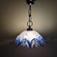 Vintage blue and white stylised flower pendant