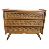 Vintage commode with tapered legs in rattan.