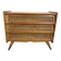 Vintage commode with tapered legs in rattan.