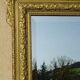 Antique mercury mirror in the Napoleon III style.