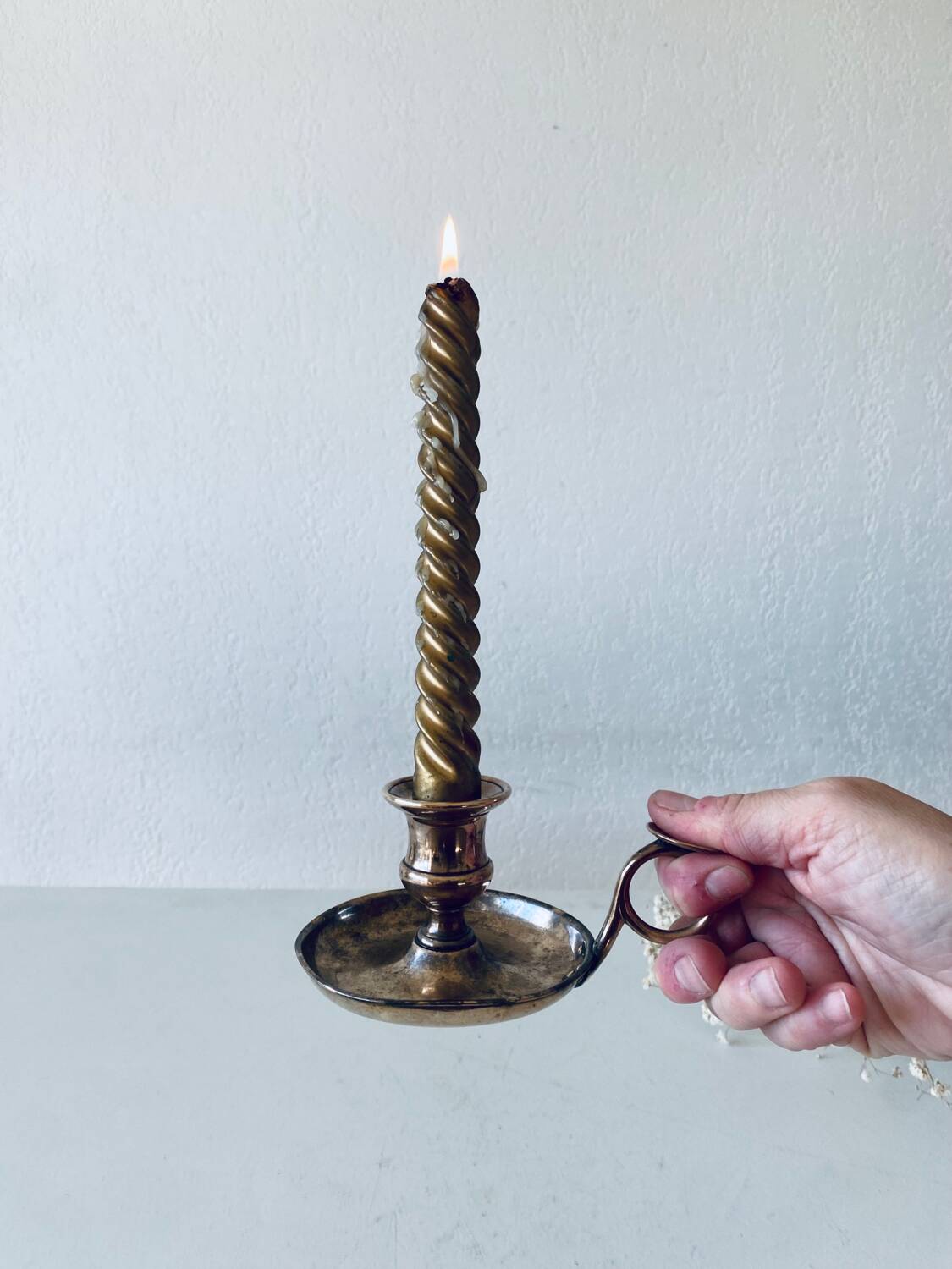 Brass thumbscrew candle holder