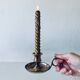 Brass thumbscrew candle holder