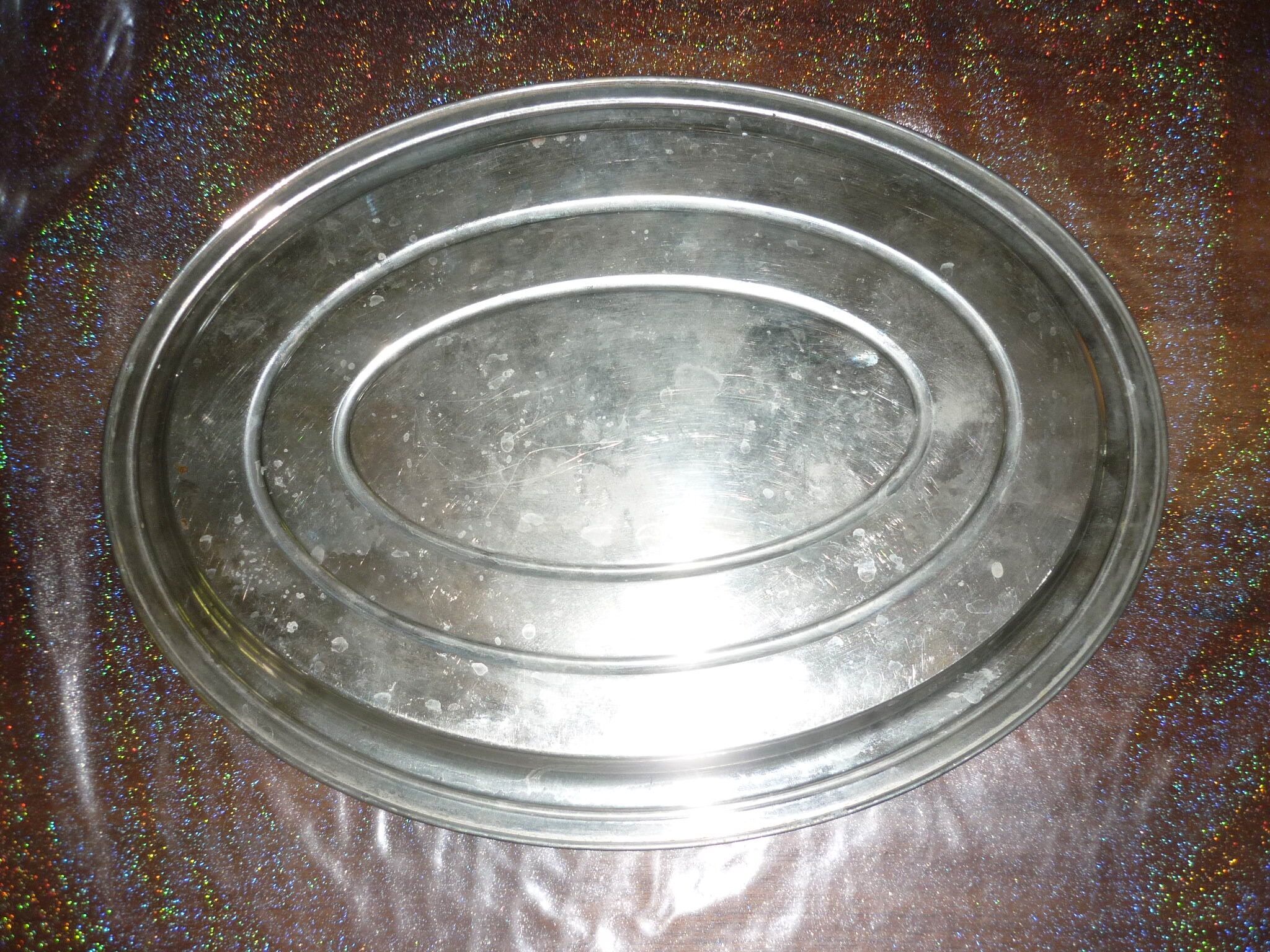 Silver metal oval top