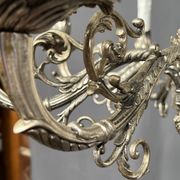Large, rare antique chandelier in solid silver-plated bronze, Empire style, 12 light points.