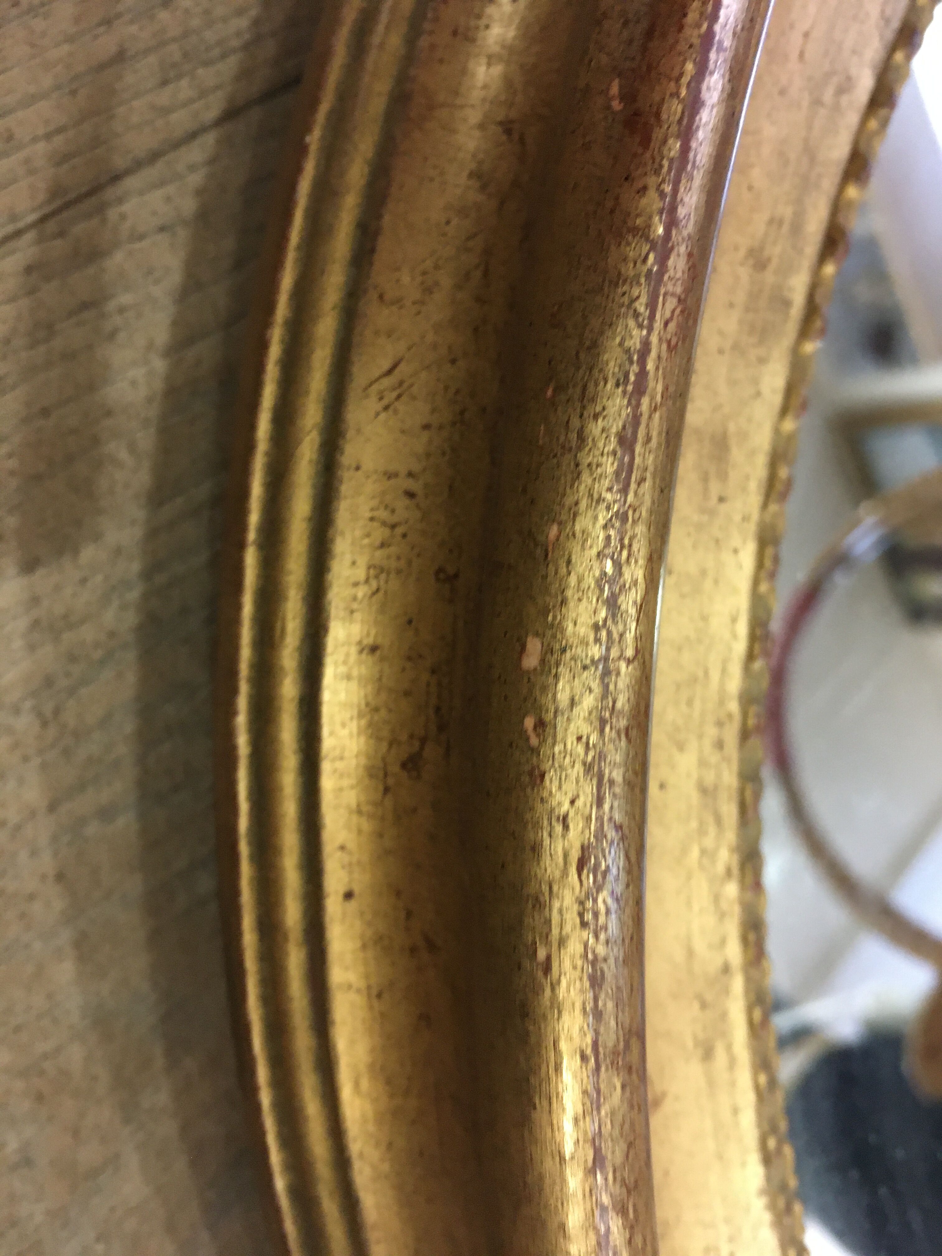 Old mirror gilded wooden frame.