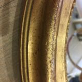 Old mirror gilded wooden frame.