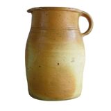 Pichet ancien en faïence française aux tons orangés