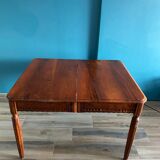 Old table in varnished solid wood