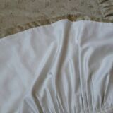 Cabinetmaker's bed frame and matching upholstered bedspread