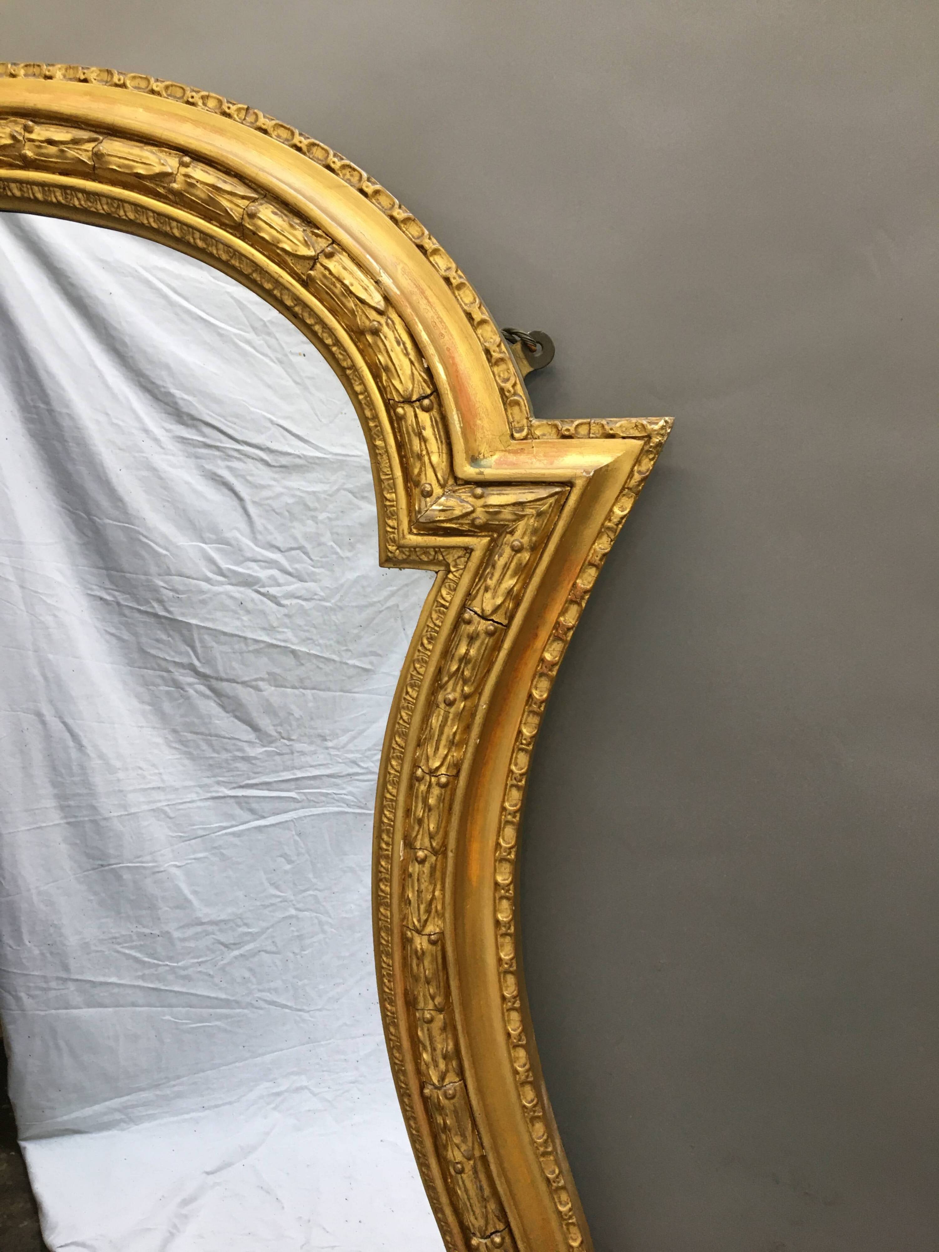 Grand miroir doré du 19ème