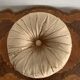Gold lamé round velvet cushion