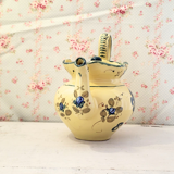 Vintage Martres-Tolosane teapot in yellow earthenware with fleur-de-lis decoration