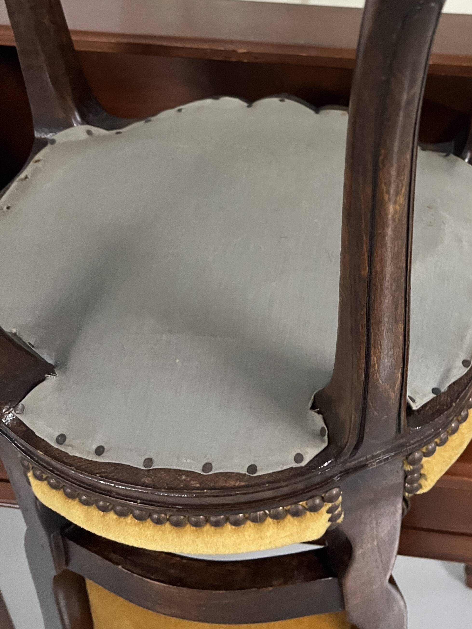 Old-fashioned secretary desk and chair set.