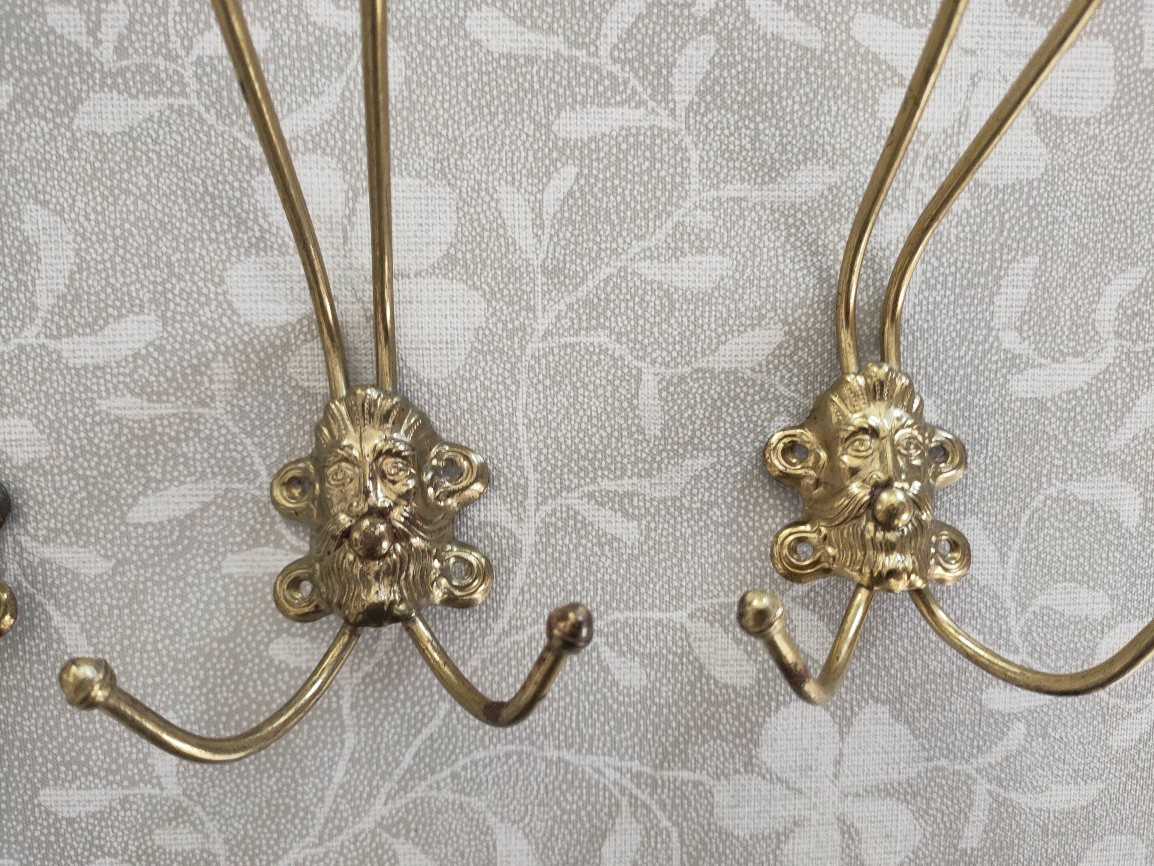 set of 5 gold metal hooks