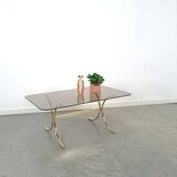 Smoked glass coffee table with gold-coloured legs from Sweden