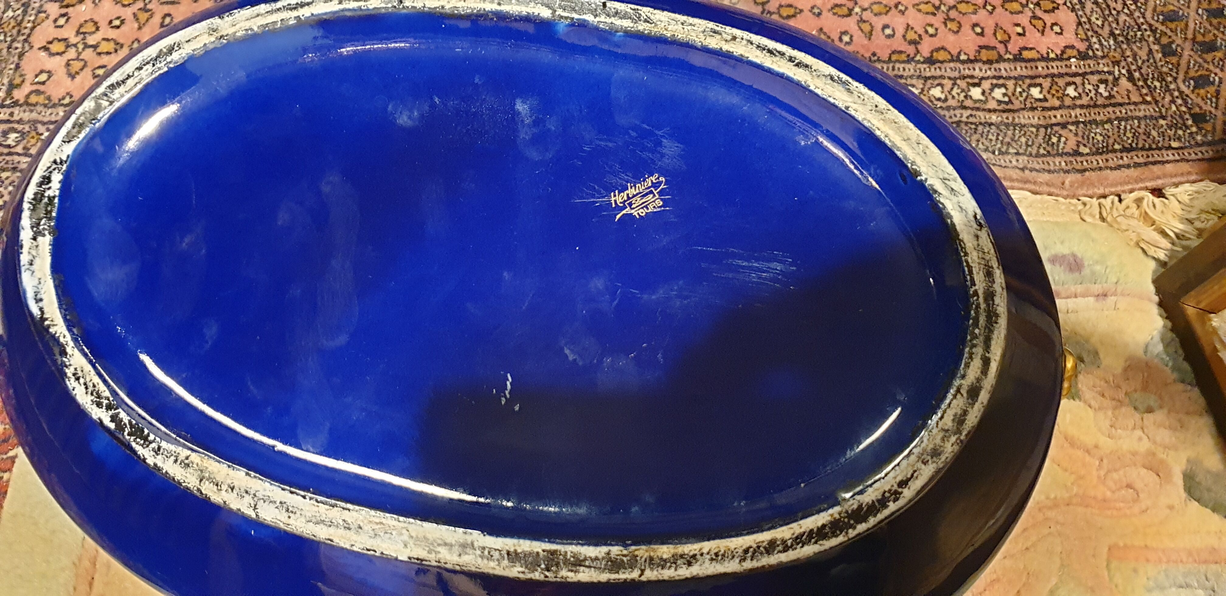 Gardener in blue porcelain of Tours, signed Herbinière.  Nineteenth century.