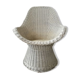 Braided rattan armchair