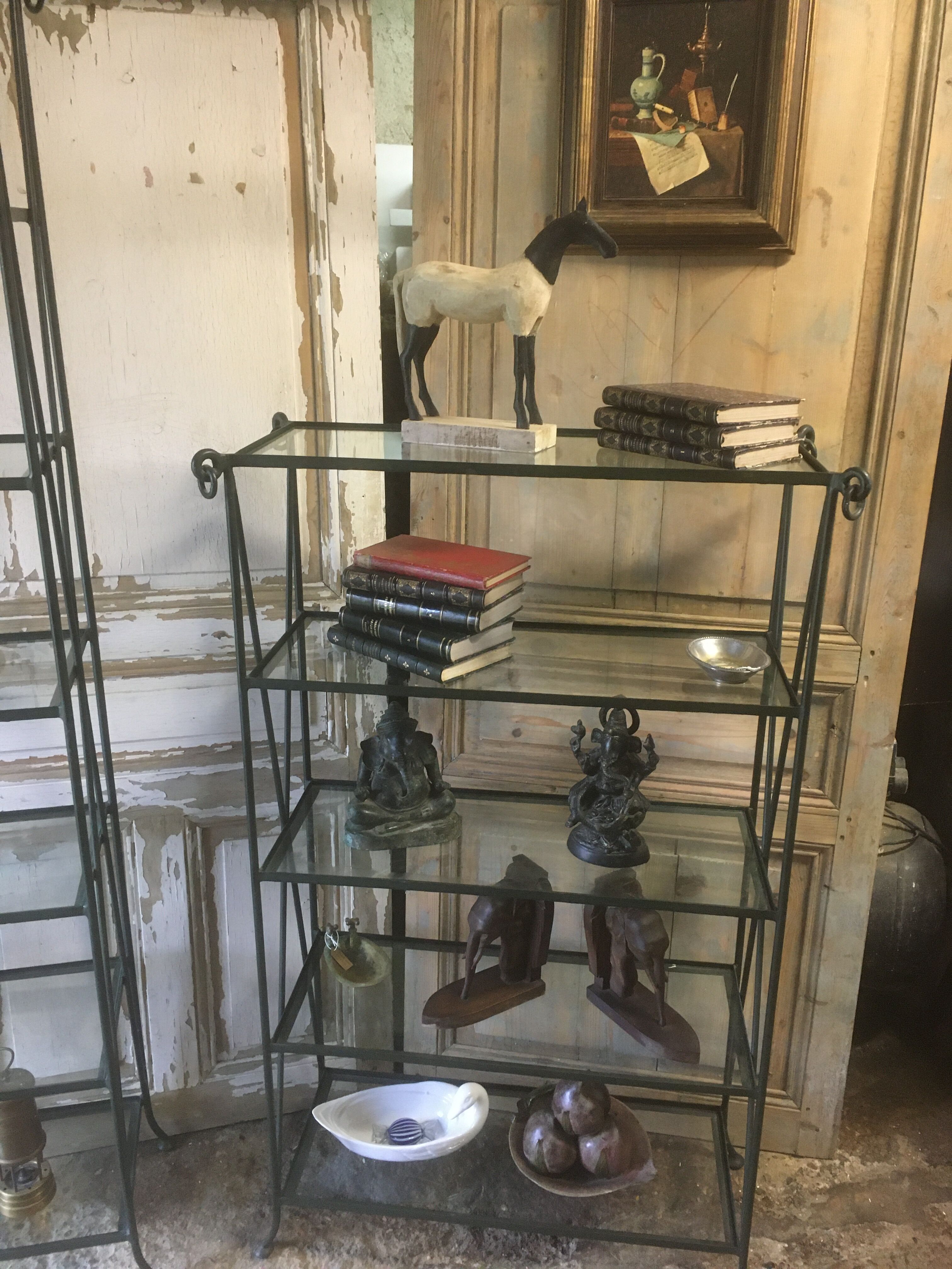 Pair of wrought iron and glass bookcase shelves