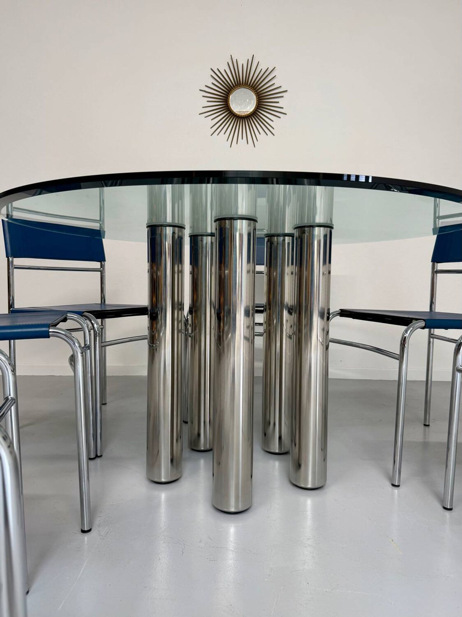 Round glass and metal dining table, Italian design from the 80s, vintage