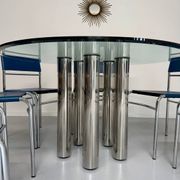 Round glass and metal dining table, Italian design from the 80s, vintage