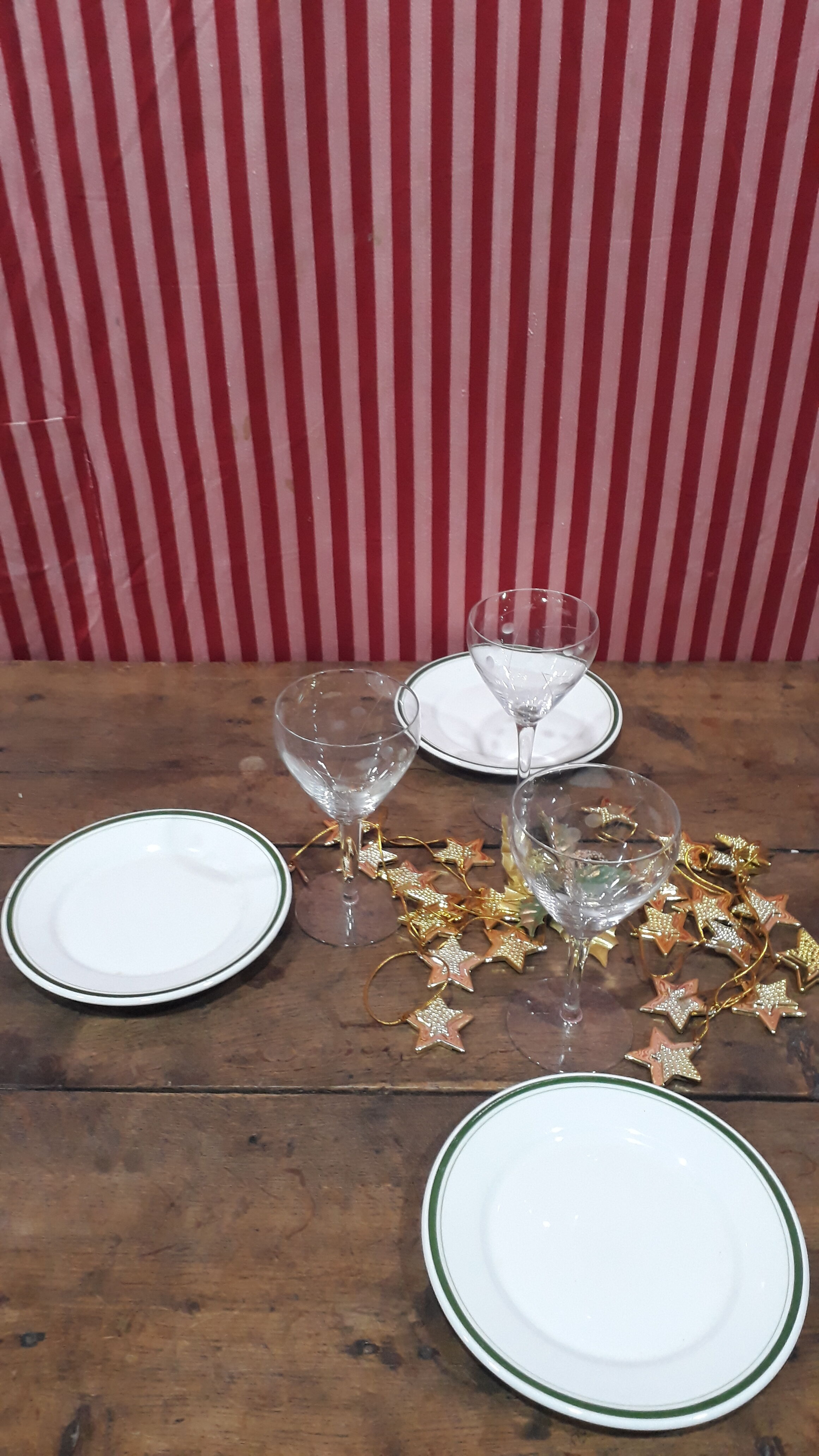 3 plates in white porcelain and green edging