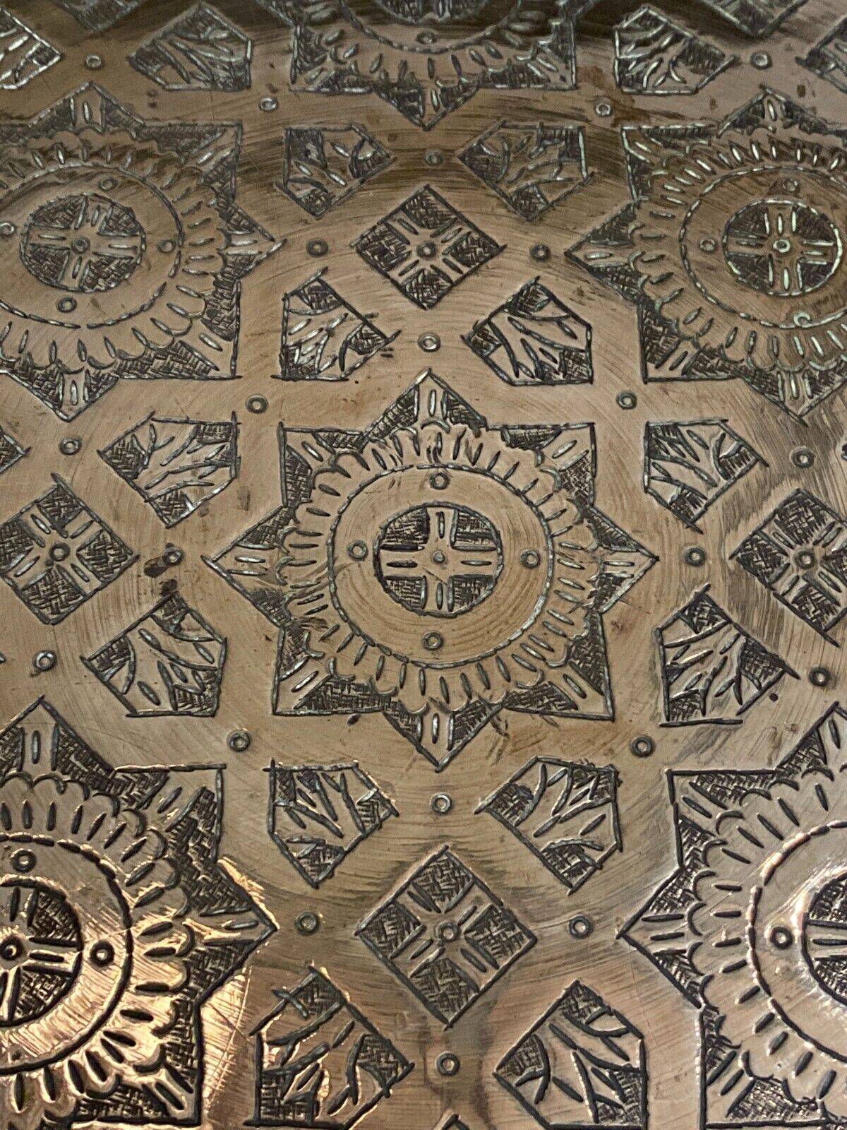 Oriental tea tray in copper or brass richly decorated 20th century