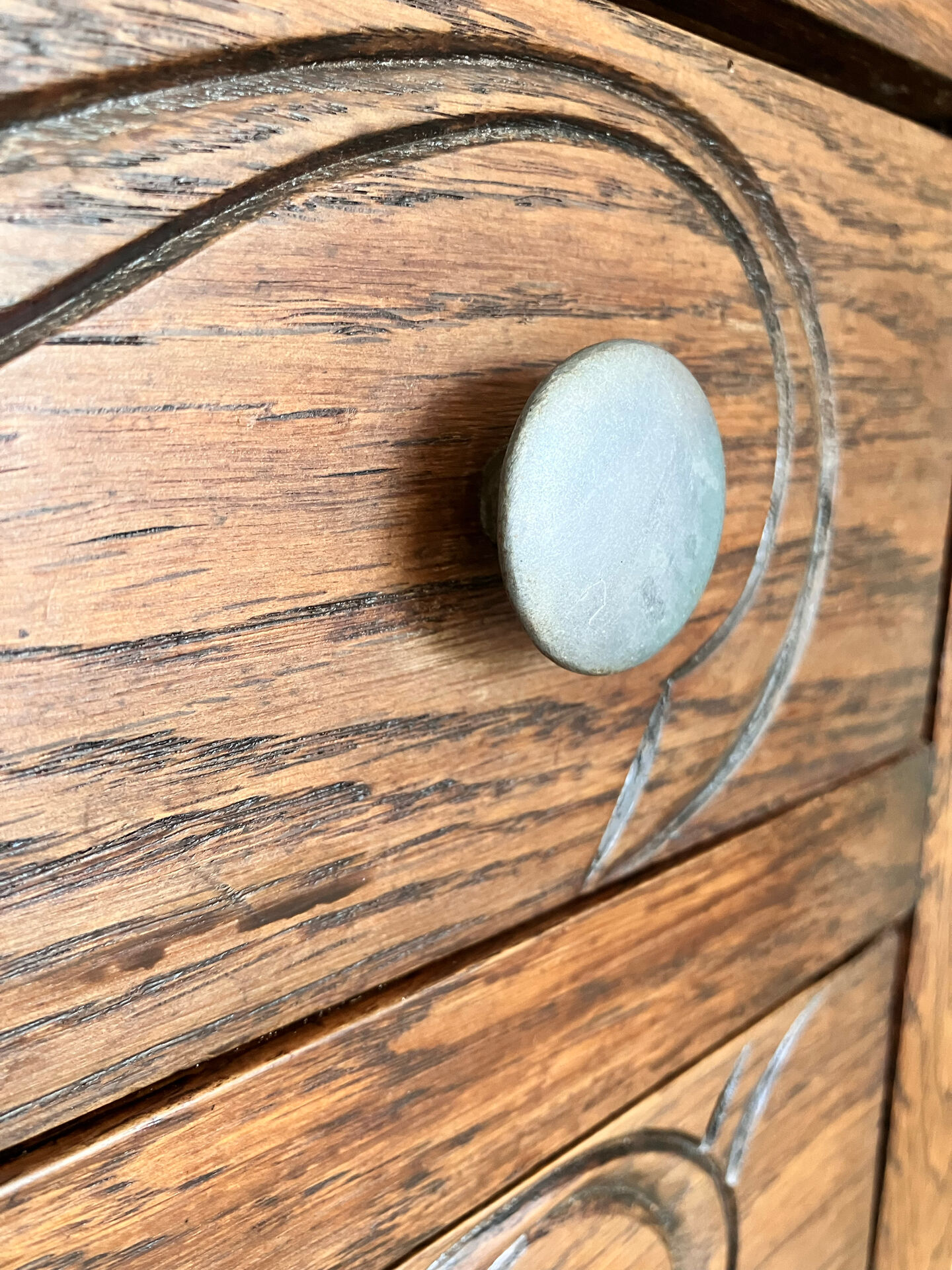 Antique commode with carved relief
