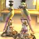Pair of porcelain candlesticks with parrots and bronze mounts.