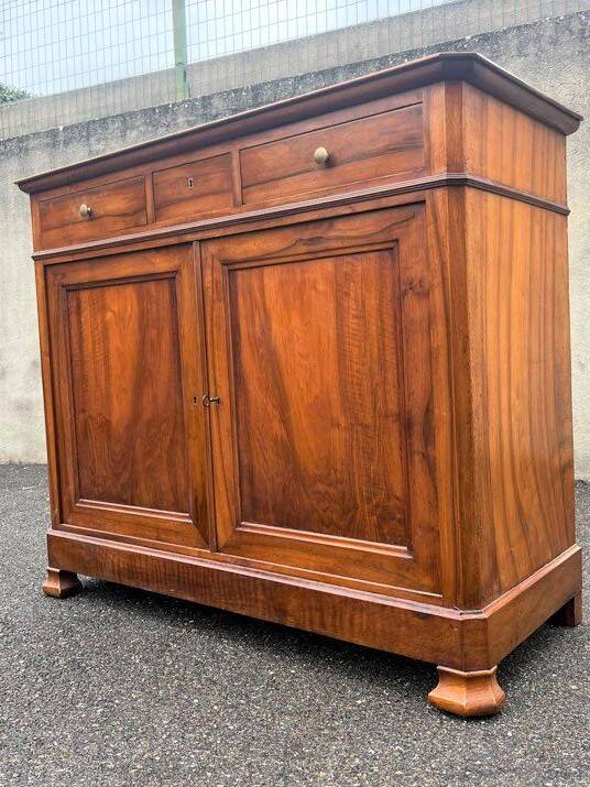 Solid walnut sideboard of the Napoleon III period, late nineteenth century, Louis Philippe style