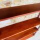 Vintage 5-tier turned wood shelf on legs.