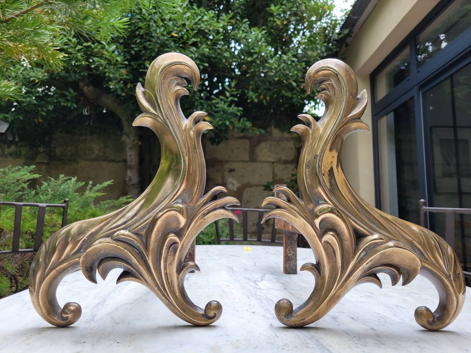 Gilded bronze chenets from the 19th century
