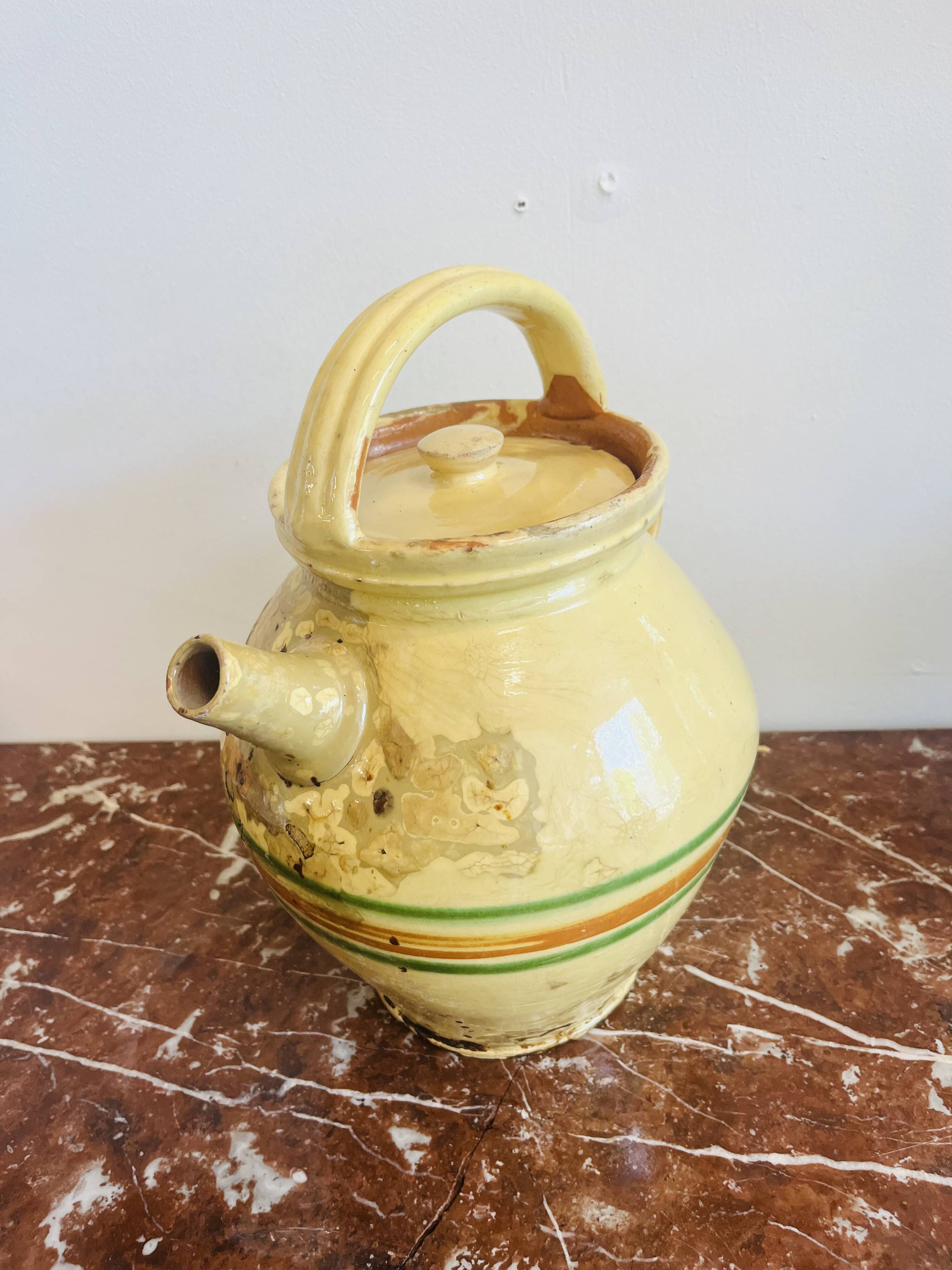 Old Savoyard pottery, decorated with orange and green edging