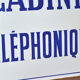 Old phone booth enamelled plate