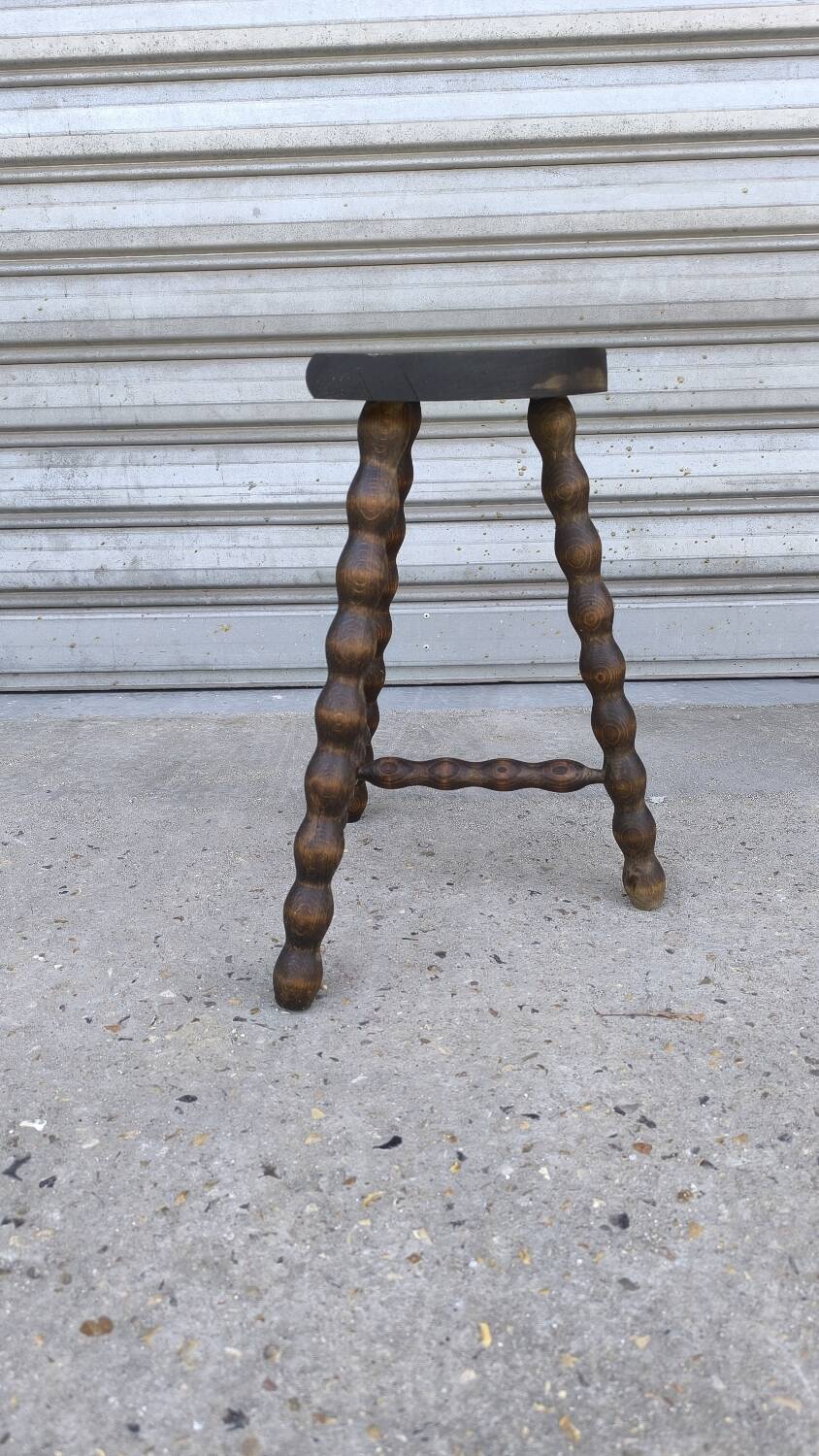 Turned wooden tripod stool