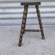 Turned wooden tripod stool