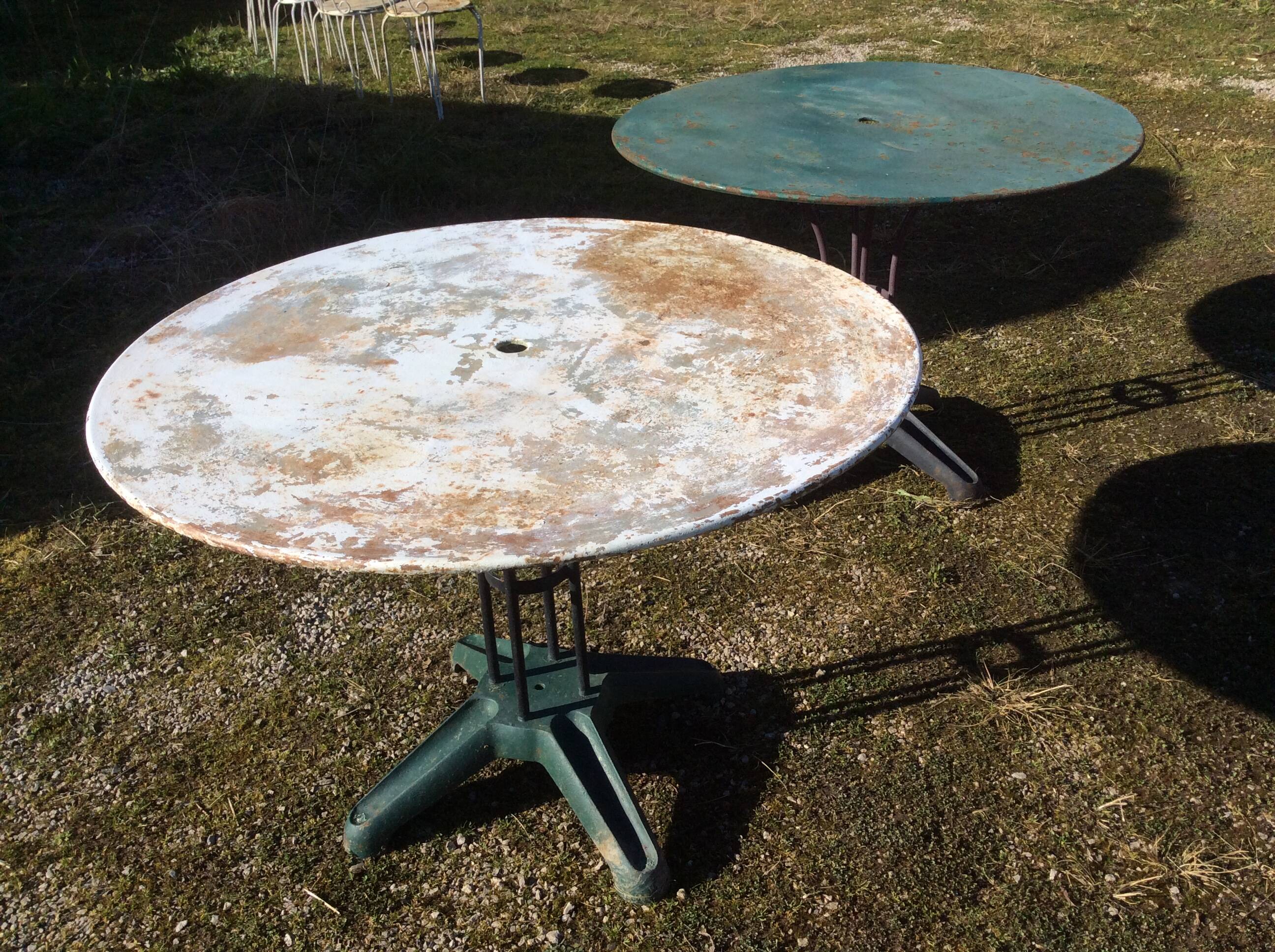 Two metal garden tables make up