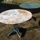 Two metal garden tables make up