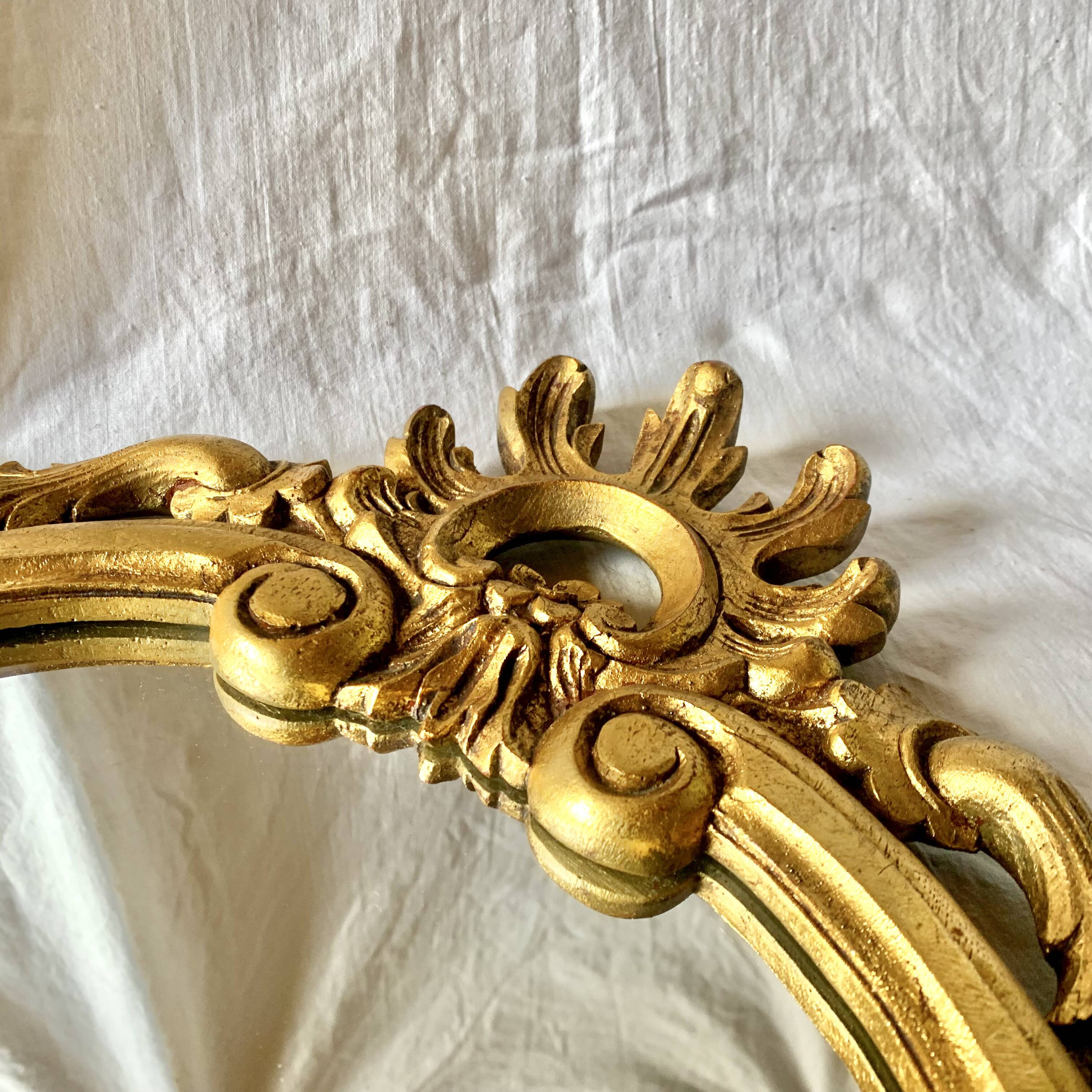 Baroque wall mirror in gilded plaster - height: 62 cm