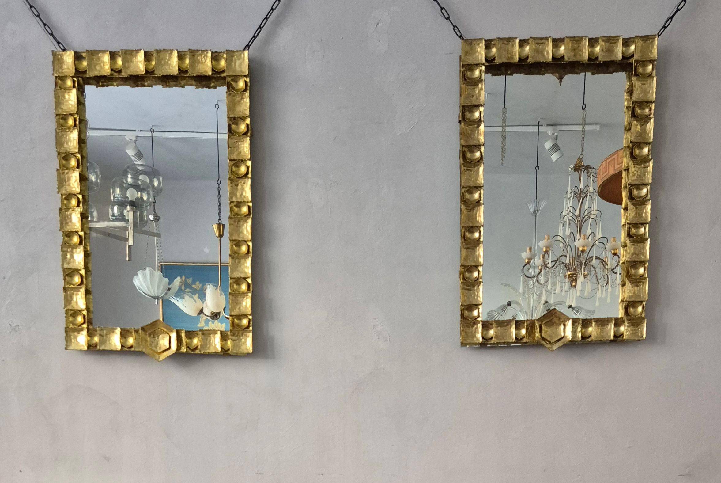 Brutalist brass mirrors by Claës E. Giertta