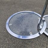 Round coffee table with swivel tops