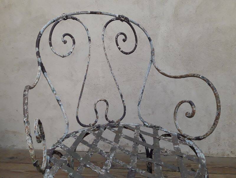 19th-century garden armchair in wrought iron
